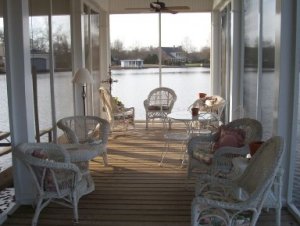Beautiful screened in area of boathouse - designed by Carolyn Barnes, Monroe, Louisiana; Built by Vines Piers, Inc., Delhi, Louisiana